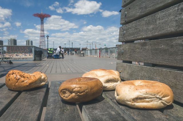 bagels on a bench at Coney Island